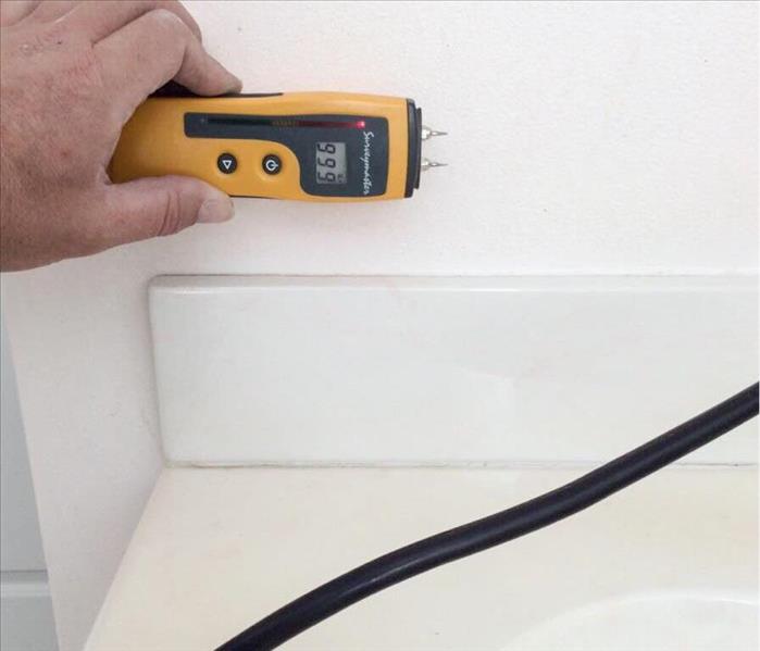 Moisture meter reading wet on drywall