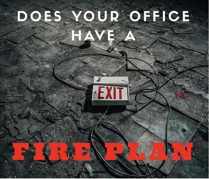 A Fire Exit sign lying on a burned out floor with caption, "Does your office have a fire plan?"