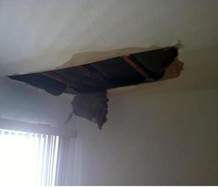 Ceiling cave in from water damage